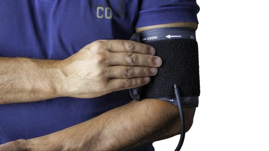 Active person monitoring health metrics during workout session