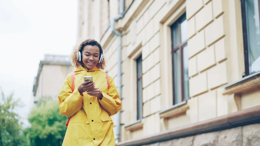Active person running outside wearing open-ear audio device while enjoying nature and staying aware of surroundings