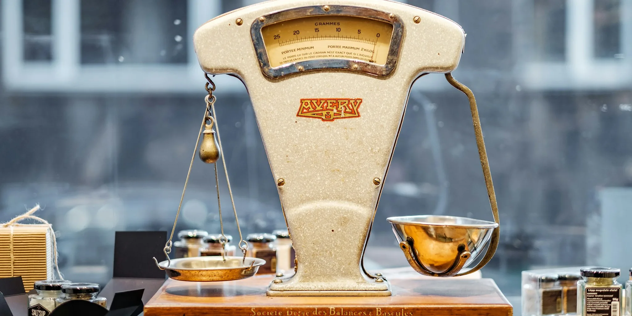 Analytical balance on laboratory bench showing precision weighing scale with digital display