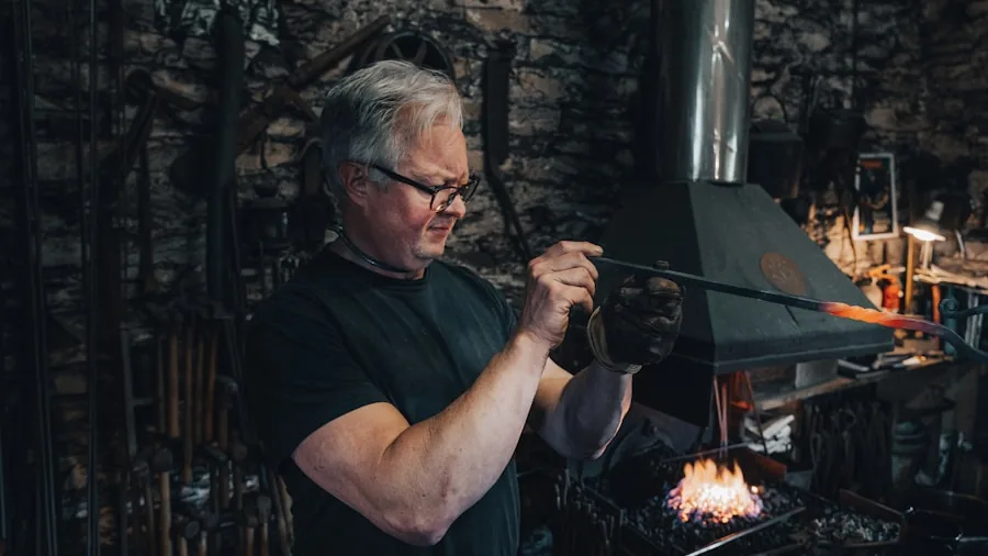 Artisan blacksmith forging heated steel blade in workshop with sparks flying