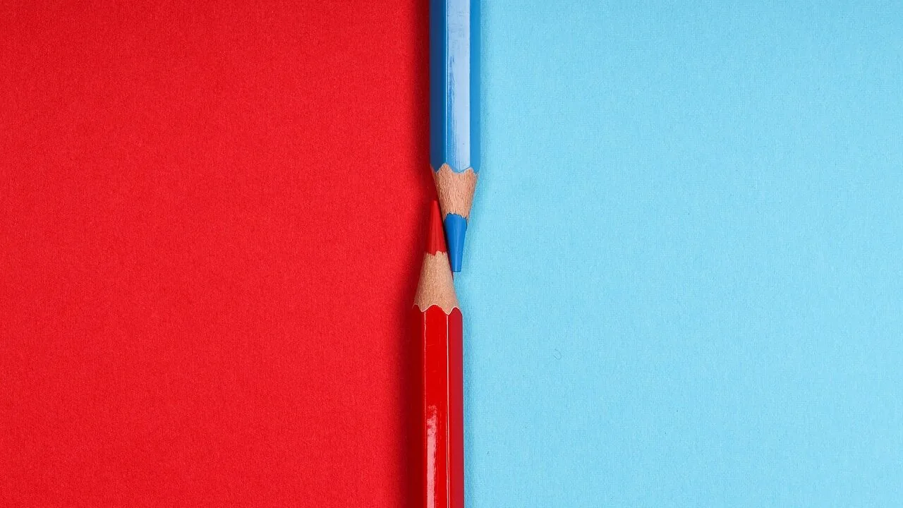 Assorted colored pencils in various vibrant colors arranged together in close-up view