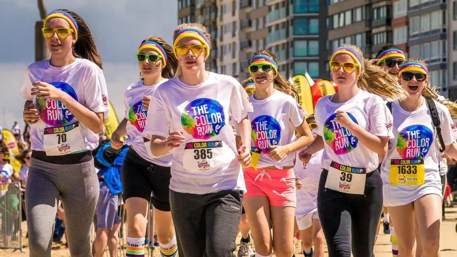 Athletic runner wearing sunglasses during outdoor jog on sunny day