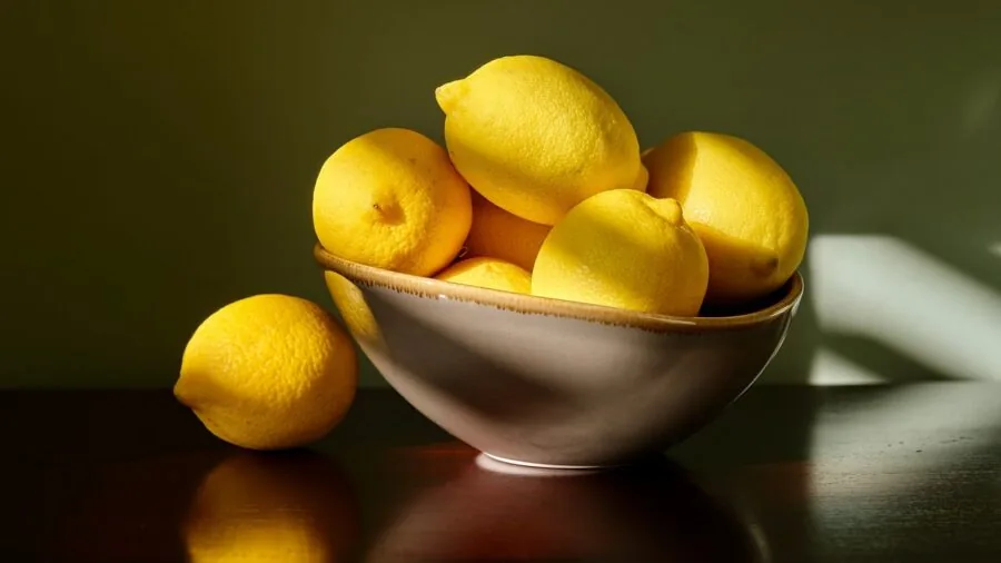 Baker preparing ingredients in various mixing bowls during home cooking preparation