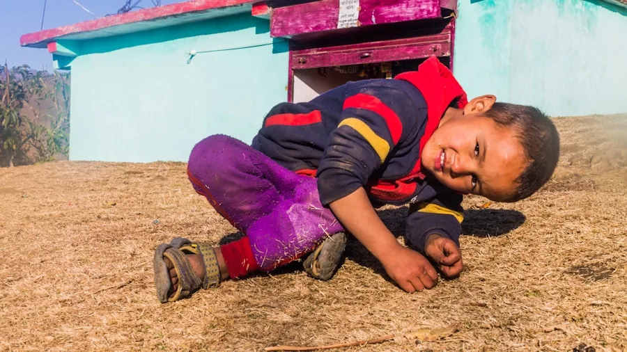 Child playing outdoors with active movement, showing wear and durability testing of everyday gear