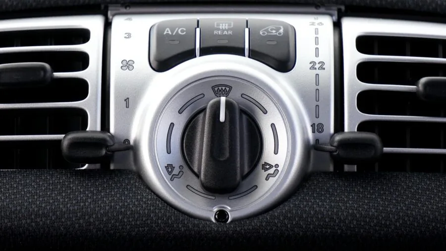 Clean car interior with fresh air flow and ventilation system visible through dashboard vents