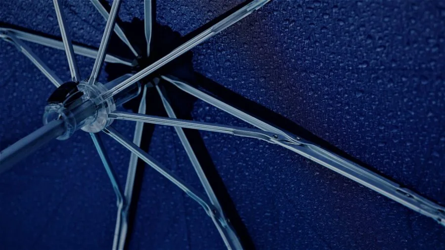 Close-up of brushed aluminum surface showing texture and weather-resistant properties in natural light