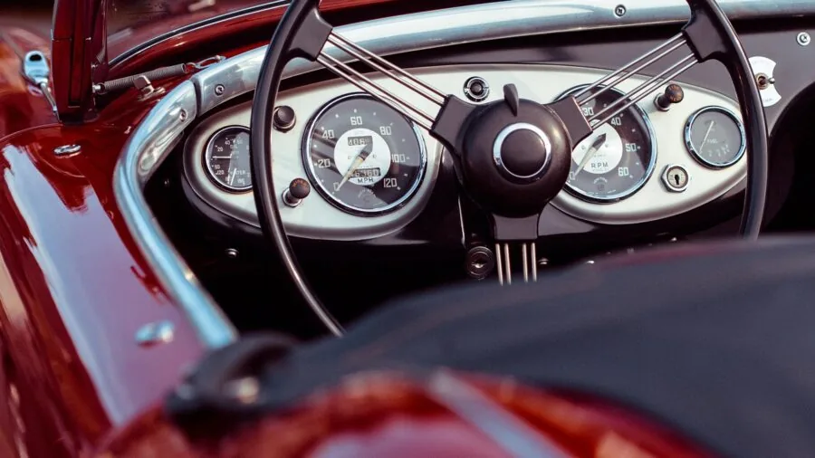Close-up of car dashboard and steering wheel in vehicle interior