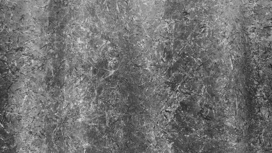 Close-up of cat's paw interacting with textured scratching surface material