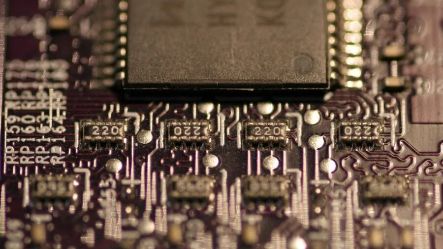 Close-up of computer cooling fan with heat dissipation in action during intense processing