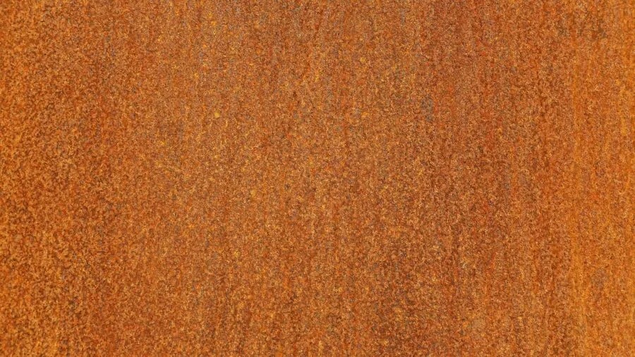 Close-up of corroded and weathered metal surfaces showing rust and oxidation patterns