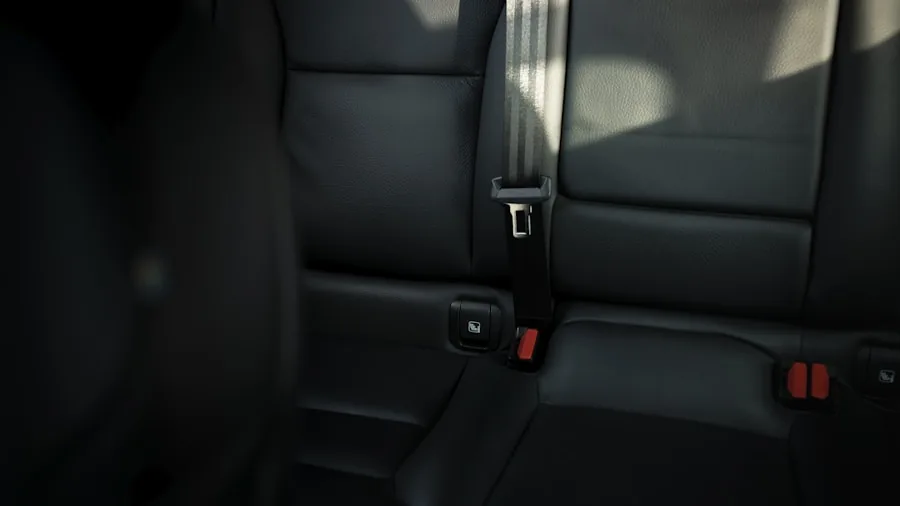 Close-up of hands adjusting car seat controls and mechanisms in vehicle interior