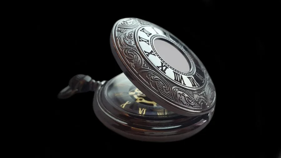 Close-up of hands adjusting precision mechanical turret dial with focus on detail and accuracy