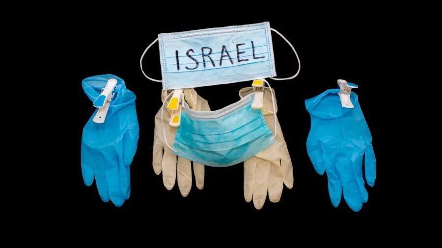 Close-up of hands inspecting work glove material and durability during selection process