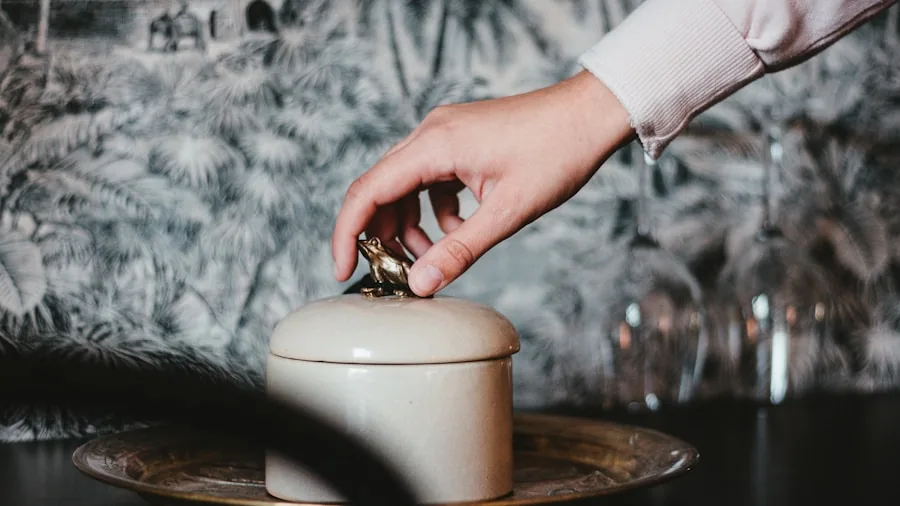 Close-up of hands opening a sealed plastic container lid in a home setting