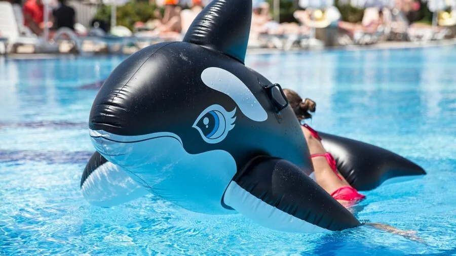 Close-up of inflatable pool float material texture showing PVC durability and construction quality