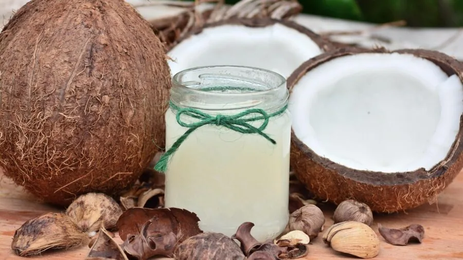 Close-up of natural oils and botanical ingredients mixed together in a skincare preparation