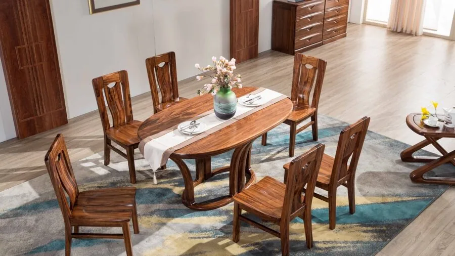 Close-up of natural wood dining chair frame showing grain and construction details