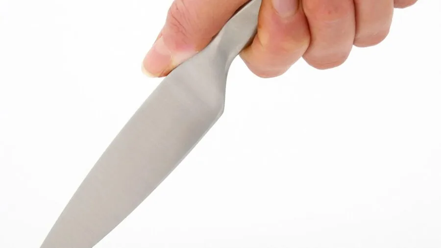 Close-up of quality stainless steel kitchen utensils showing durable metallic finish and professional construction