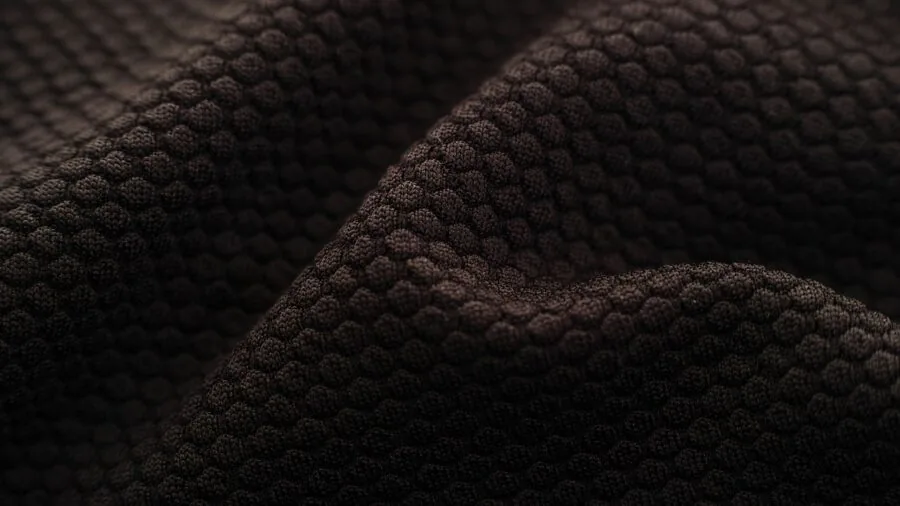 Close-up of soft, fluffy white fabric showing textile weave and density detail