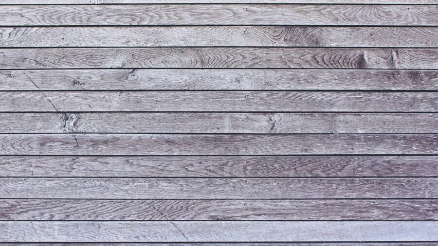Close-up of solid wood furniture frame showing joinery and construction quality in natural lighting