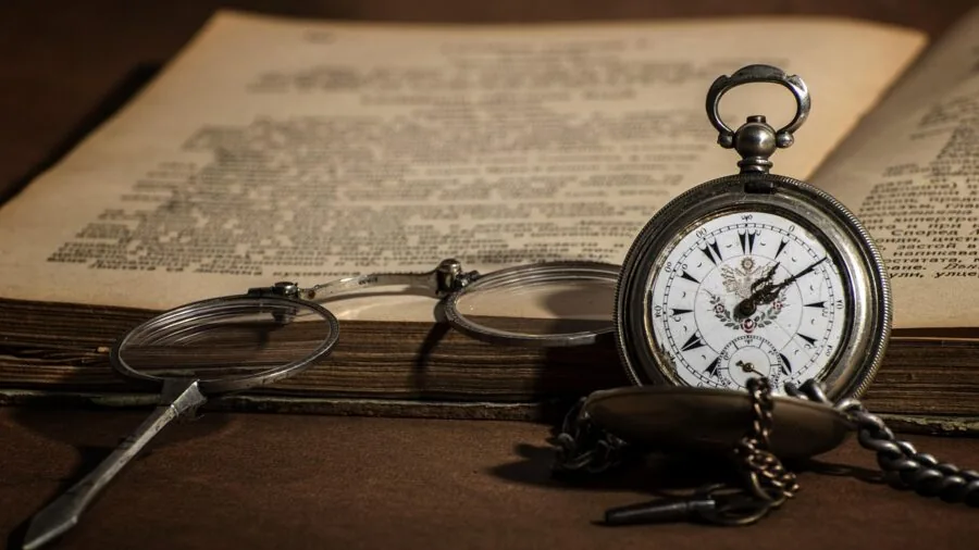 Close-up of someone checking their watch dial while wearing it, emphasizing legibility and readability