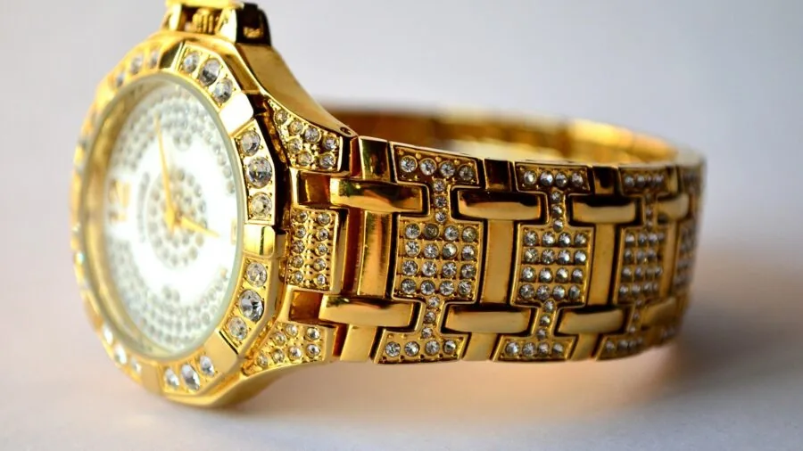 Close-up of someone measuring a watch band with precision tools in natural lighting