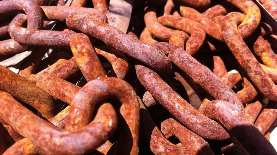 Close-up of weathered metal frame showing rust resistance and outdoor durability in natural conditions