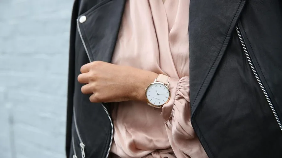Close-up of woman's wrist wearing an elegant watch, lifestyle photography