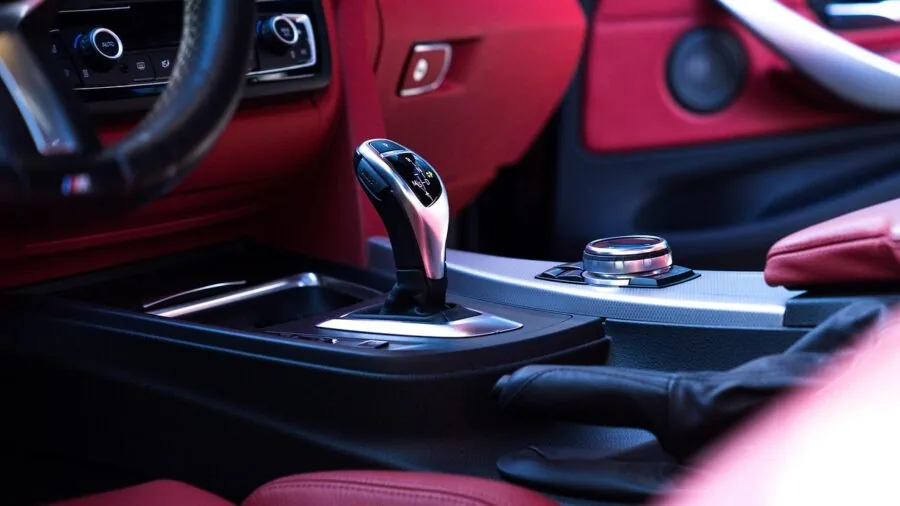 Close-up view of a car cup holder showing practical storage details in vehicle interior