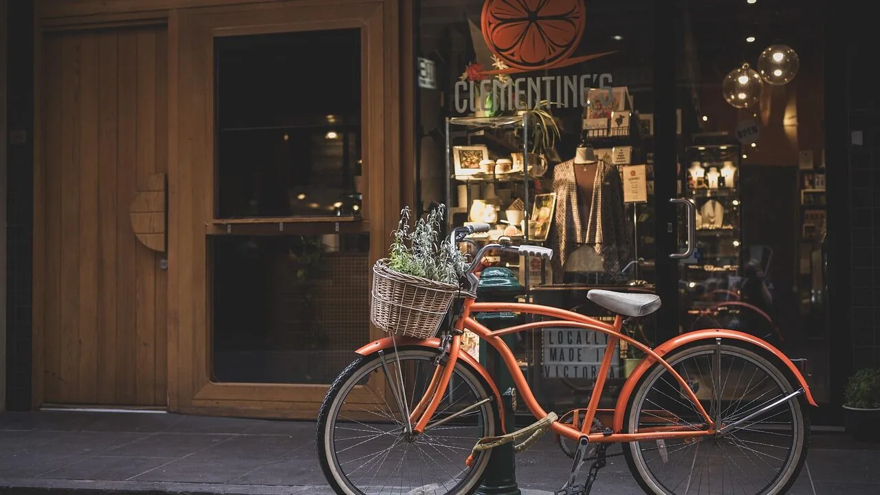 Collection of colorful bike helmets displayed side by side