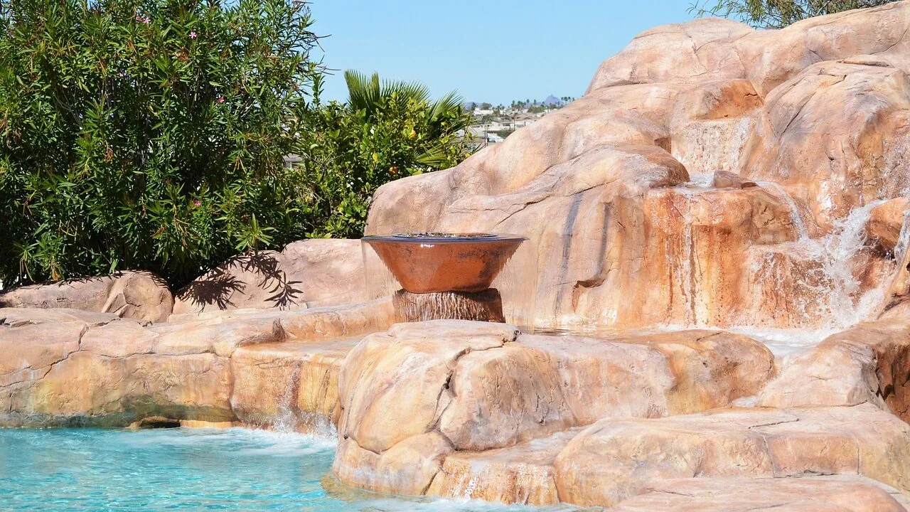 Colorful kids swimming pool set up in backyard with water