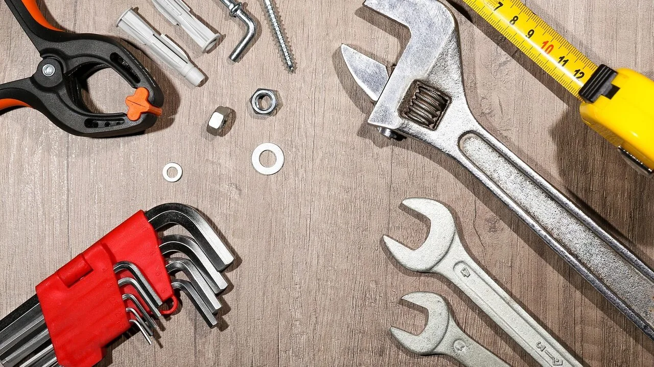Complete wrench set with various sizes arranged on workbench