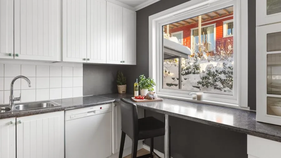 Contemporary kitchen interior with stylish flooring and ergonomic workspace design