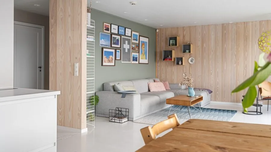 Contemporary living room with gallery-wrapped canvas art displayed on white wall above furniture