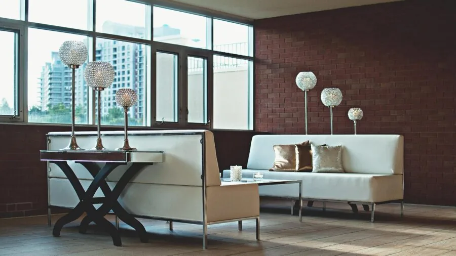 Contemporary living room with warm ambient lighting in a multi-room home setup