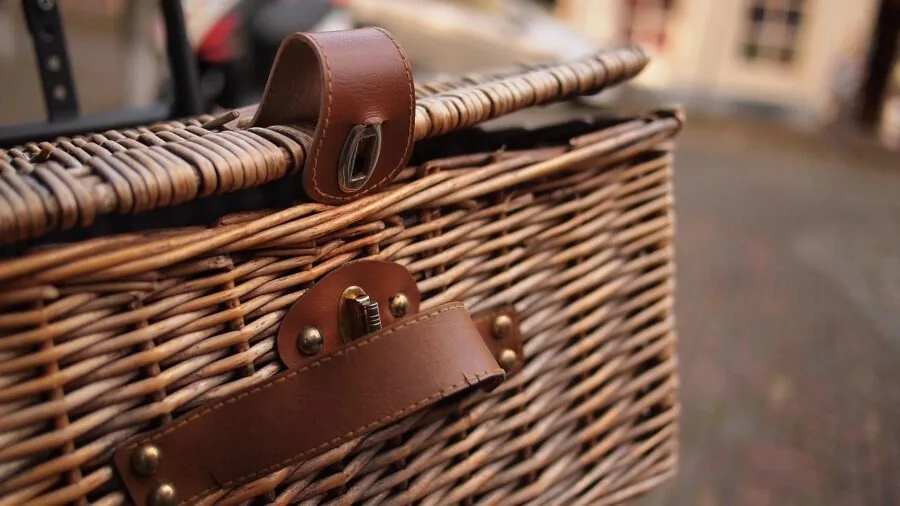 Cyclist organizing repair tools in a compact case for everyday bike maintenance and portability