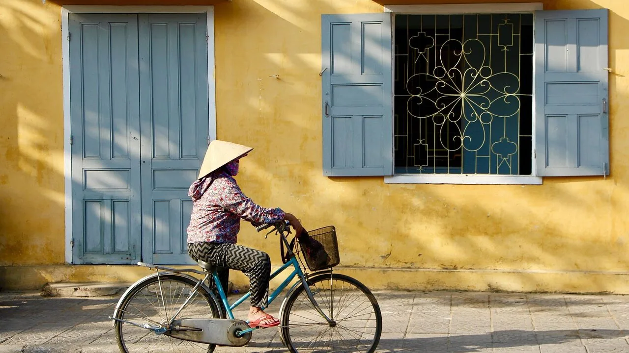 Cyclist wearing colorful cycling jersey on road bike