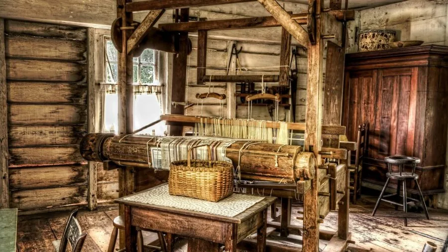 DIY enthusiast assembling wooden furniture with tools in home workshop