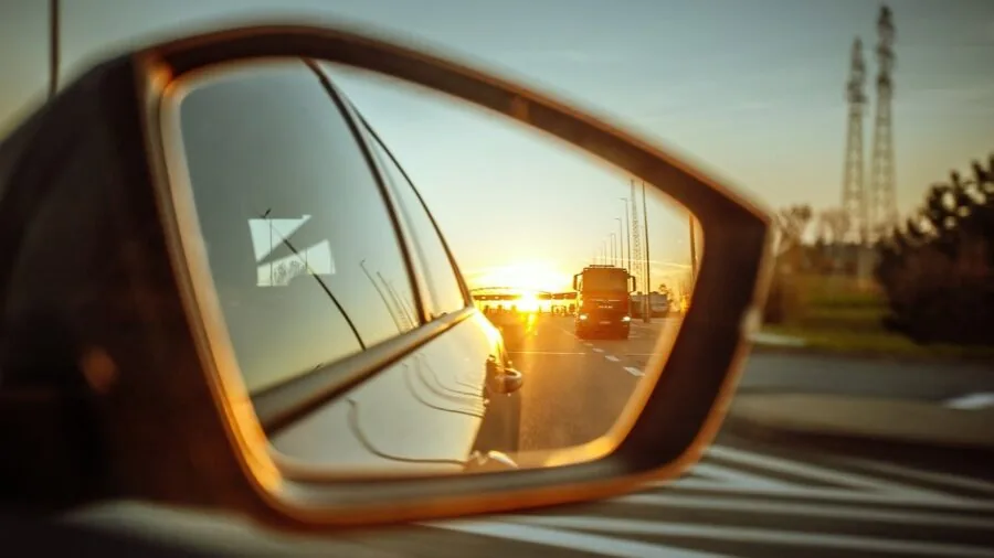 Driver's view from car window during road trip on open highway