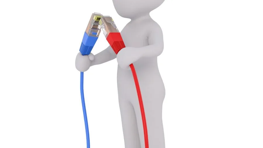 Electrician examining electrical wire connection and gauge compatibility during installation work