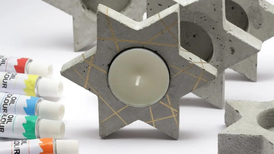 Elegant brass candle holder displaying warm candlelight in a cozy home interior setting