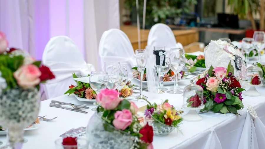 Elegant crystal glasses on a wooden table with warm lighting, showcasing fine glassware craftsmanship