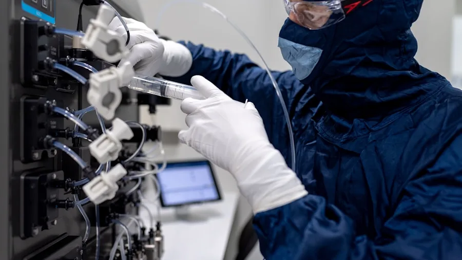 Engineer testing electronic equipment at workbench in modern laboratory setting