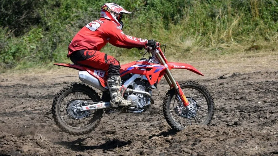 Experienced rider in protective gear on motorcycle, showcasing quality equipment investment