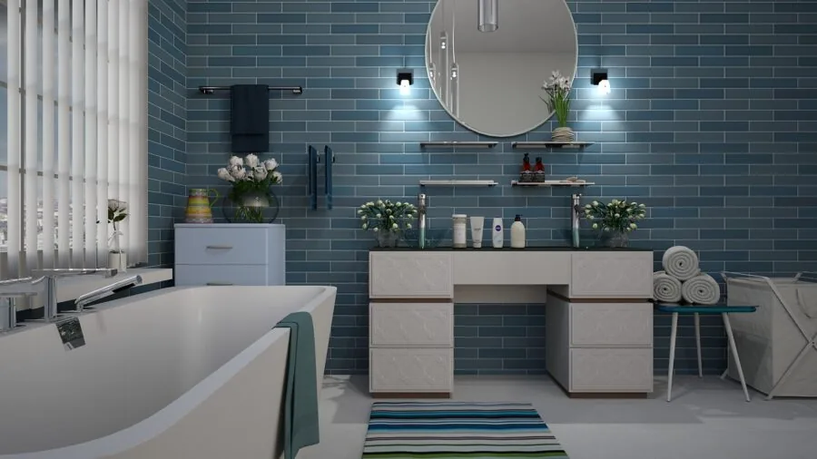 Faded bathroom towels showing color loss from repeated washing and use