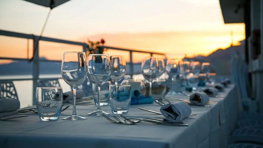 Family enjoying a meal together at a dining table with casual dinnerware and natural lighting