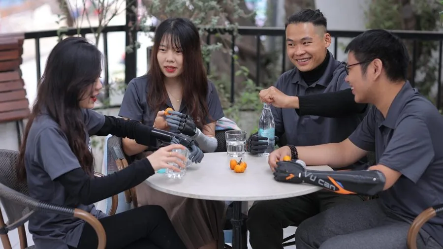 Family enjoying popcorn snacks together during casual gathering indoors