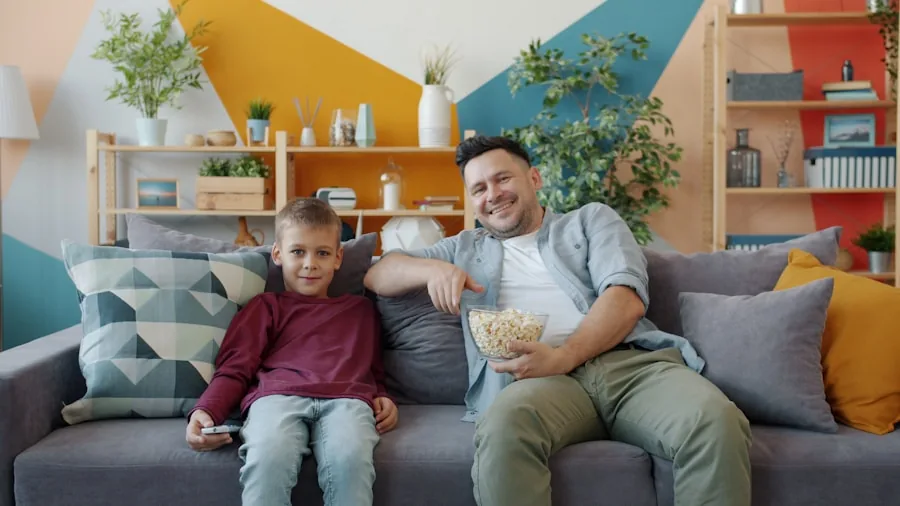Family enjoying quality time while watching television in a modern living room setting