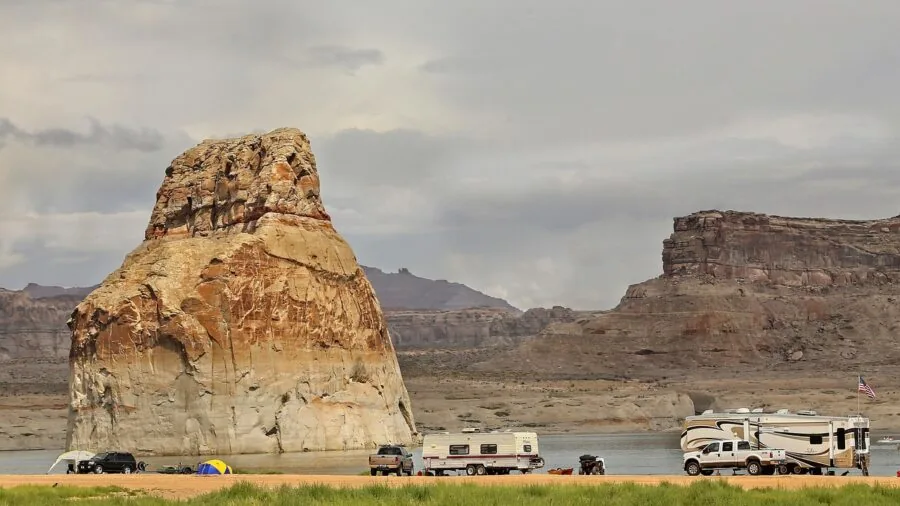 Family enjoying time together inside a recreational vehicle during a camping trip