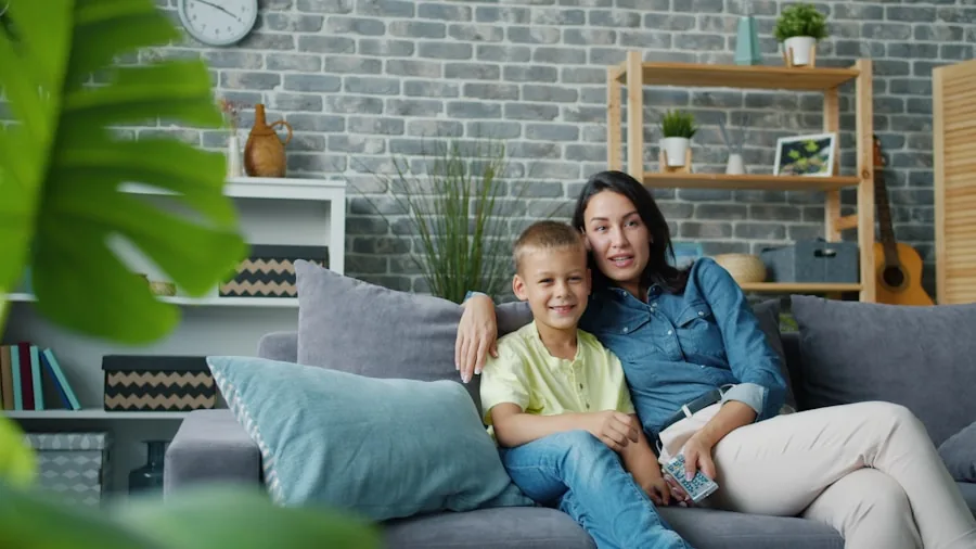 Family gathered in living room watching television together, enjoying entertainment